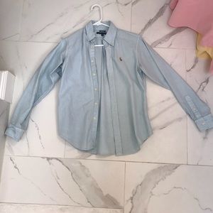 Woman’s Blue and white striped polo